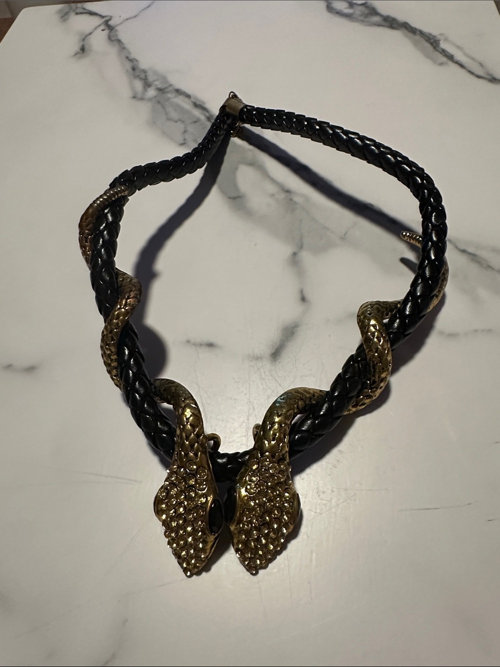Gold-Tone Snake Head Necklace with Black Braided Cord